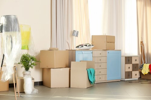 Local removals planning in Lampton with boxes and moving van
