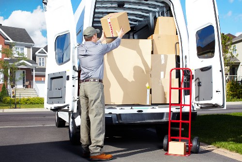 Packed boxes and furniture ready for small removals in Lampton