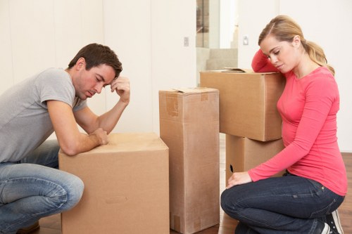 Moving team loading household items for a Lampton relocation
